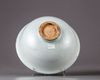A white glazed 'dragon' bowl