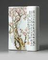 A Chinese famille rose 'prunus' brush rest