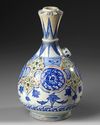 A SAFAVID KIRMAN POTTERY BOTTLE VASE, PERSIA, 17TH CENTURY