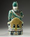 A Chinese famille verte biscuit figure of Guandi