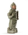 A CHINESE CELADON GUAN YU FIGURE, MING DYNASTY, 15TH CENTURY