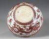 A Chinese underglaze copper-red-decorated 'dragon' bowl