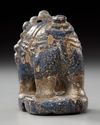 A NISHAPUR LAPIS LAZULI CHESS PIECE, ELEPHANT FORM, PERSIA, 9TH-12TH CENTURY