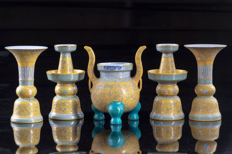 A Chinese yellow-ground famille rose altar set