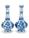 A PAIR OF CHINESE BLUE AND WHITE HEXAGONAL BOTTLE VASES, KANGXI PERIOD (1662-1722)