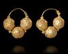 A PAIR OF EARLY ISLAMIC GOLD EARRINGS, 12TH CENTURY