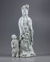 AN EXCEPTIONAL LARGE DEHUA GLAZED FIGURE OF A GUANYIN WITH A CHILD, 20TH CENTURY