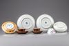 A group of ten Chinese famille rose cups and saucers