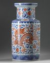 A large Chinese iron-red-decorated blue and white 'dragon and phoenix' rouleau vase