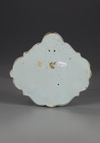 A POLYCHROME PLAQUETTE WITH FLOWER BASKET, CA 1740 DELFT