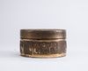 A Chinese bronze 'Immortals' round box and cover