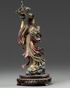 A Chinese polychrome-decorated ivory figure of a maiden