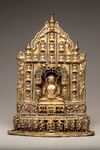 A gilt bronze Jain Tirthankara with silver inlay