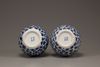 A pair of blue and white double gourd vases