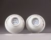 A pair of small 'famille rose' bowls