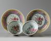 A pair of Chinese famille rose 'floral' cups and saucers