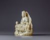 A Chinese celadon jade Shakyamuni