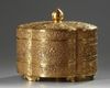 A large Chinese brass lobed three-tiered box and cover
