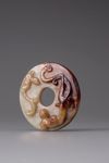 A pale celadon and russet jade bi disc