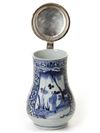A JAPANESE BLUE AND WHITE JUG WITH SILVER COVER, 17TH CENTURY