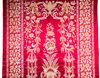 AN OTTOMAN EMBROIDERED RED HANGING PANEL, 20TH CENTURY