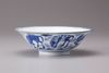 A blue and white conical bowl