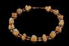 A TURQUOISE AND PEARL-SET PARCEL GOLD BAZUBAND, PERSIA OR ANATOLIA, 12TH-13TH CENTURY
