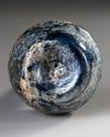 A TALL-NECKED BLUE GLASS BOTTLE, PERSIA OR SYRIA, 11TH-12TH CENTURY