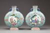 A matched pair of Chinese turquoise-ground famille rose moonflasks
