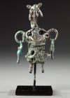 A WESTERN ASIATIC AMLASH OPENWORK BRONZE IDOL, CIRCA 1ST MILLENNIUM B.C.