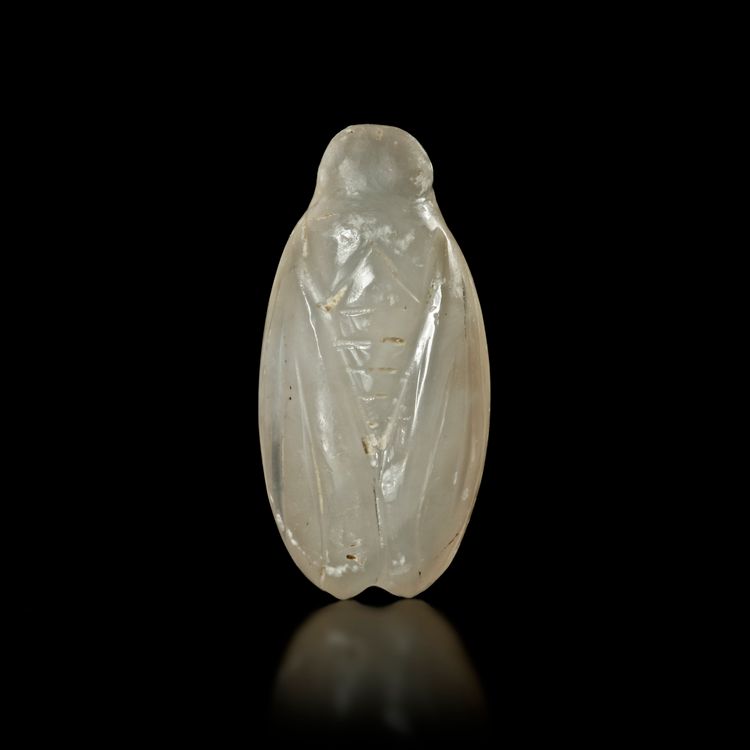 A ROMAN CHALCEDONY AMULET IN THE FORM OF A CICADA, 1ST CENTURY AD