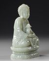 A CHINESE CARVED JADE SEATED BUDDHA, QING DYNASTY (1644–1911)