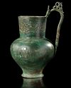 A SELJUK ENGRAVED BRONZE EWER, 12TH CENTURY