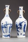 Two similar moulded Chinese blue and white twin-handled vases