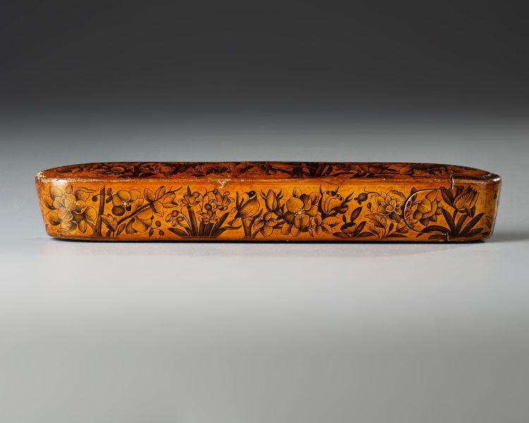 A QAJAR LACQUERED PAPIER-MACHÉ QALAMDAN (PEN BOX), PERSIA, 19TH CENTURY