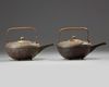 A PAIR OF JAPANESE SAKE-KETTLES, MEIJI PERIOD (1868-1912)
