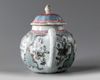 A Chinese famille rose moulded 'floral' teapot and cover