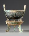 A CHINESE ARCHAIC BRONZE RITUAL FOOD VESSEL (  CHANG ZI DING), EARLY WESTERN ZHOU DYNASTY 1046-771 B.C