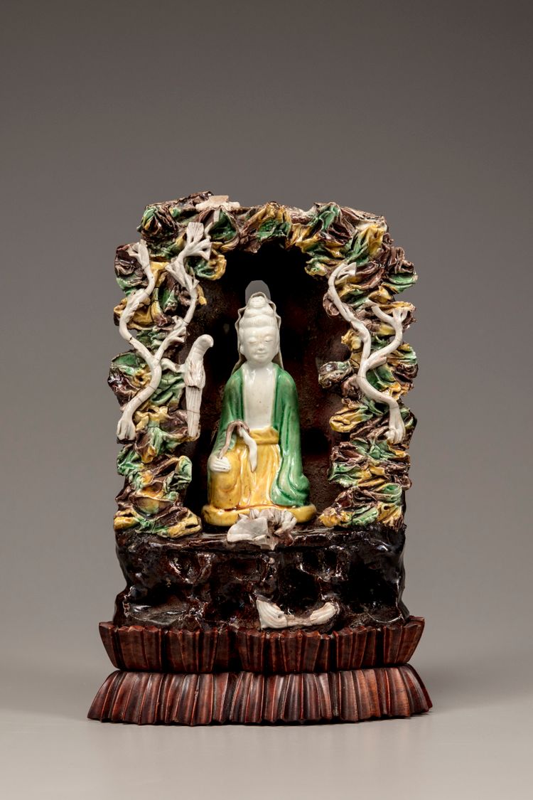 A Chinese green, yellow, and aubergine-glazed grotto
