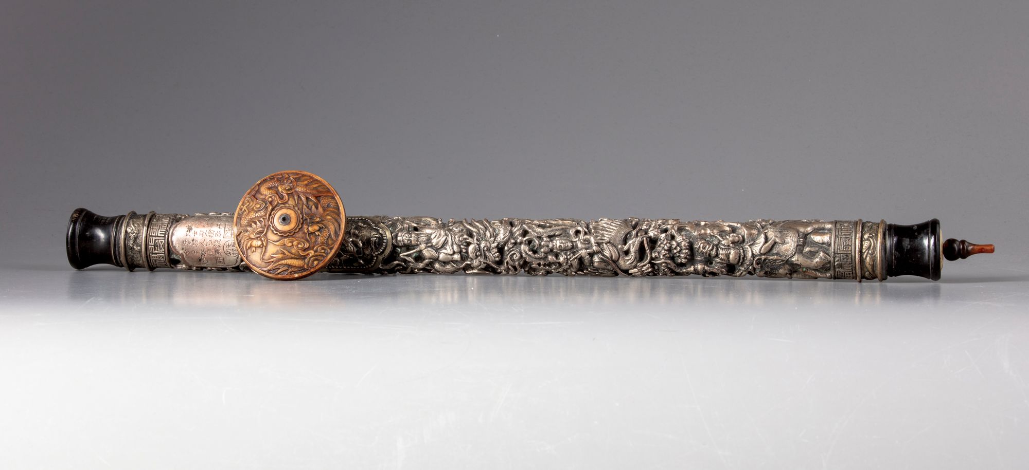 A CHINESE BONE AND SILVER PLATED CARVED OPIUM PIPE, 20TH CENTURY