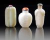 A GROUP OF THREE CHINESE JADE SNUFF BOTTLES