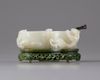 A white jade 'chilong' twin-cup and spinach green stand