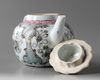 A Chinese famille rose moulded 'floral' teapot and cover