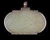 AN OVAL SAFAVID JADE TALISMANIC PENDANT