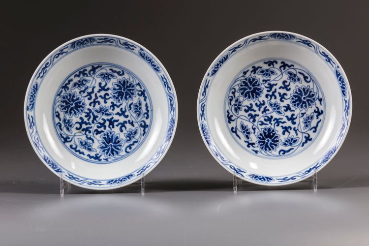 A pair of Chinese blue and white 'lotus' dishes