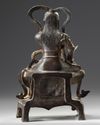 A Chinese gilt lacquered bronze figure of Guandi