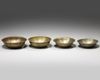 A GROUP OF FOUR MAGIC BOWLS, PERSIA, 18TH-19TH CENTURY