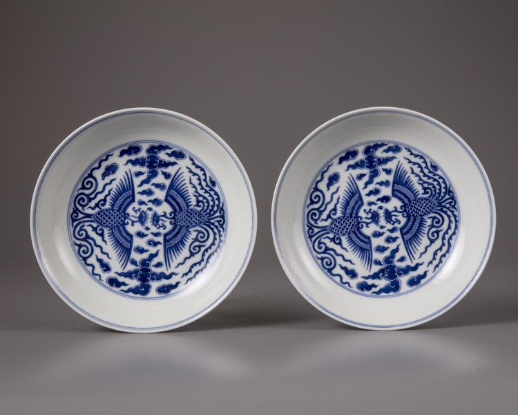 A PAIR OF CHINESE BLUE AND WHITE 'PHOENIX' DISHES, QING DYNASTY (1644-1911)