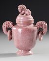 A CARVED PINK STONE LION VASE,  CHINA, 20TH CENTURY