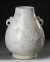 A CHINESE CARVED HU-FORM VASE, QING DYNASTY (1644-1911)